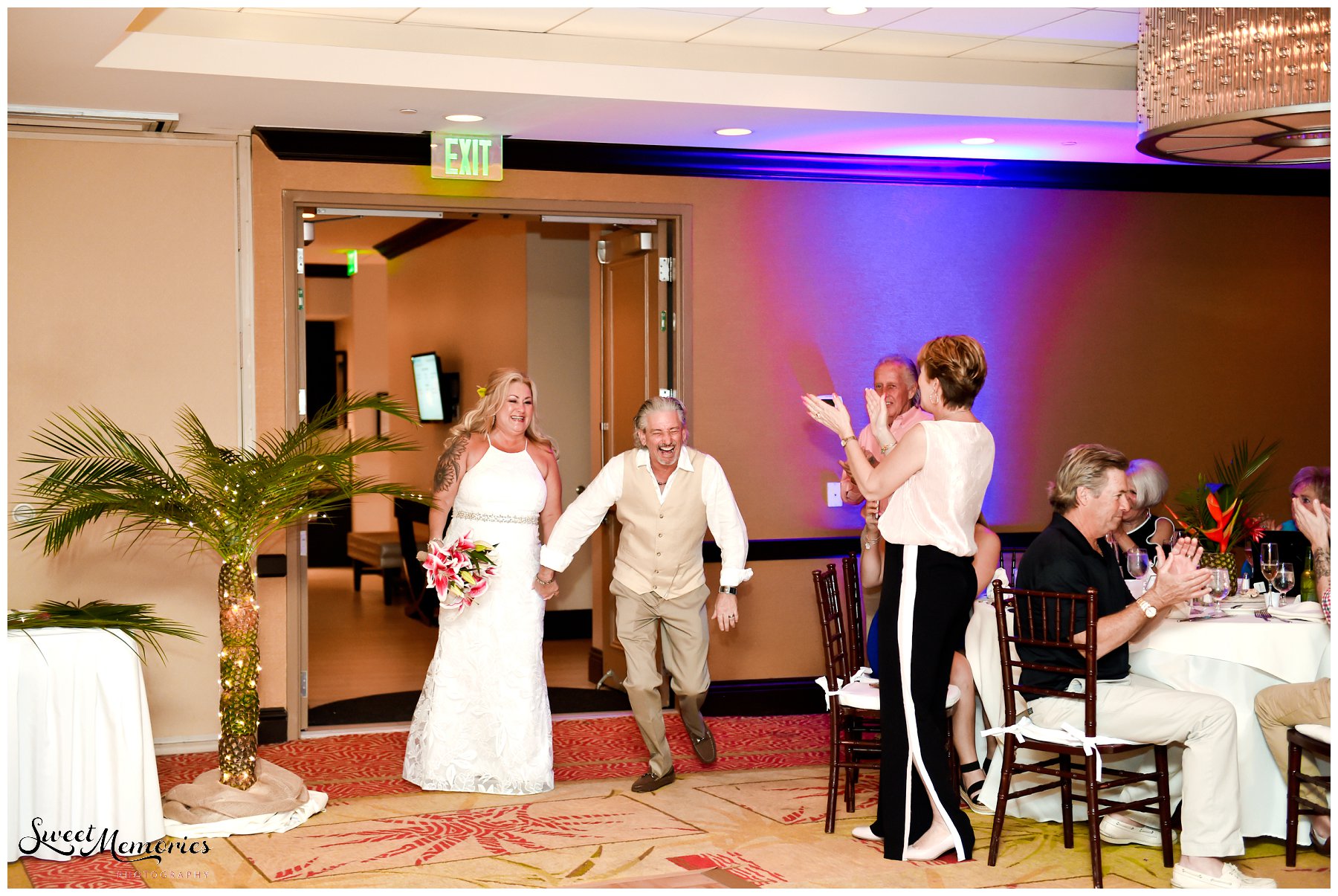 When you want a tropical wedding, look no further than sunny Florida! And this tropical wedding at the Wyndham Deerfield Beach Resort sets the bar high, with its sweetheart table lined with pineapple palm trees and every table decked out in pineapples and birds of paradise!