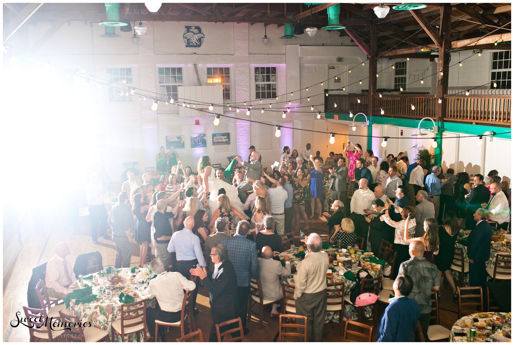 Zoey and Max's Fieldhouse at Old School Square Wedding: The Fieldhouse at Old School Square in Delray Beach caught the couple's attention. Since Max and Zoey are a very casual couple, they wanted "something a little more 'us' that had an understated charm."