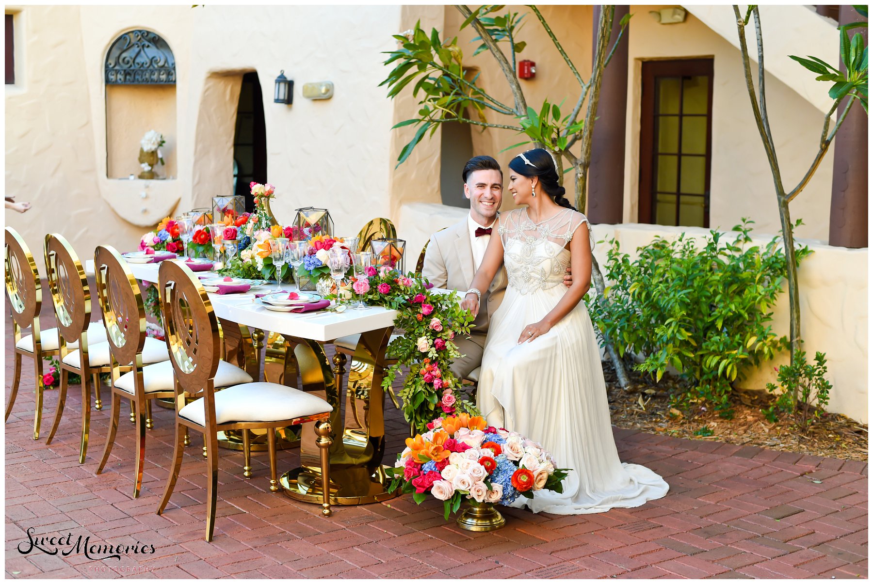 Vibrant floral arrangements, luxurious gold details, a sparkling bridal gown…and a cozy lounge area with a magic carpet! This styled shoot is the perfect nod to Disney’s Aladdin and this Aladdin inspired wedding.