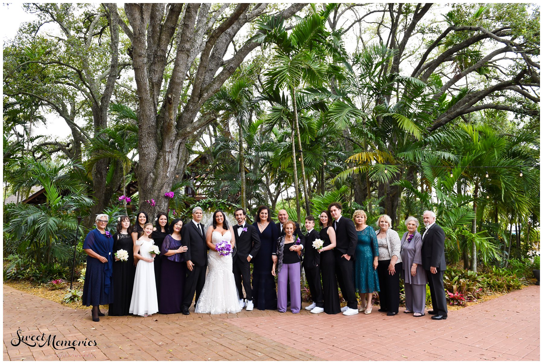 Tropical yet classic, Janice and Michael's Living Sculpture Sanctuary wedding in Davie was the perfect mix of romantic, hilarious, fun, sweet, and chic! After having met at a restaurant, his persistence, and a romantic proposal at the Flamingo gardens, they are now ready to tie the knot!