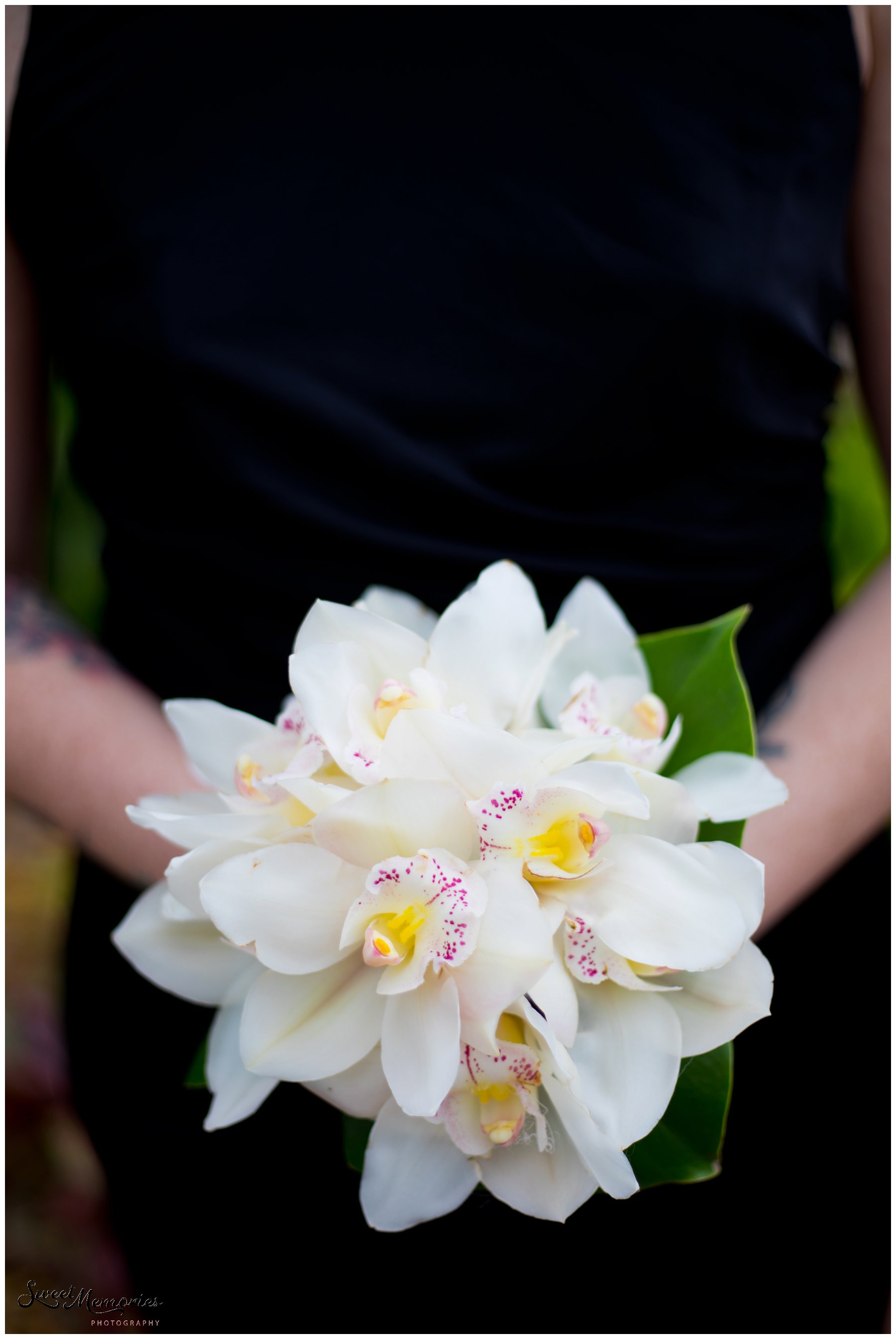 Tropical yet classic, Janice and Michael's Living Sculpture Sanctuary wedding in Davie was the perfect mix of romantic, hilarious, fun, sweet, and chic! After having met at a restaurant, his persistence, and a romantic proposal at the Flamingo gardens, they are now ready to tie the knot!