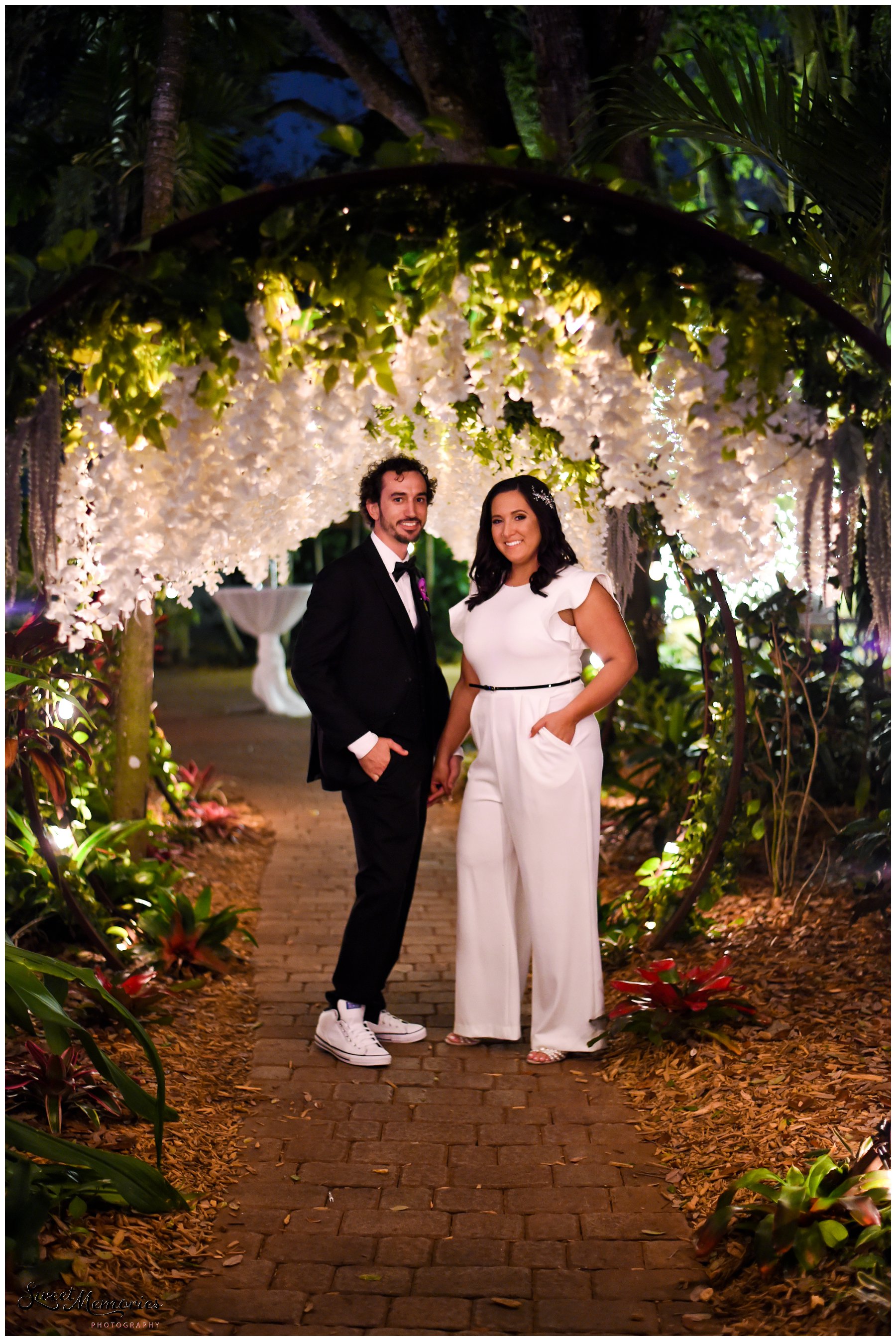 Tropical yet classic, Janice and Michael's Living Sculpture Sanctuary wedding in Davie was the perfect mix of romantic, hilarious, fun, sweet, and chic! After having met at a restaurant, his persistence, and a romantic proposal at the Flamingo gardens, they are now ready to tie the knot!