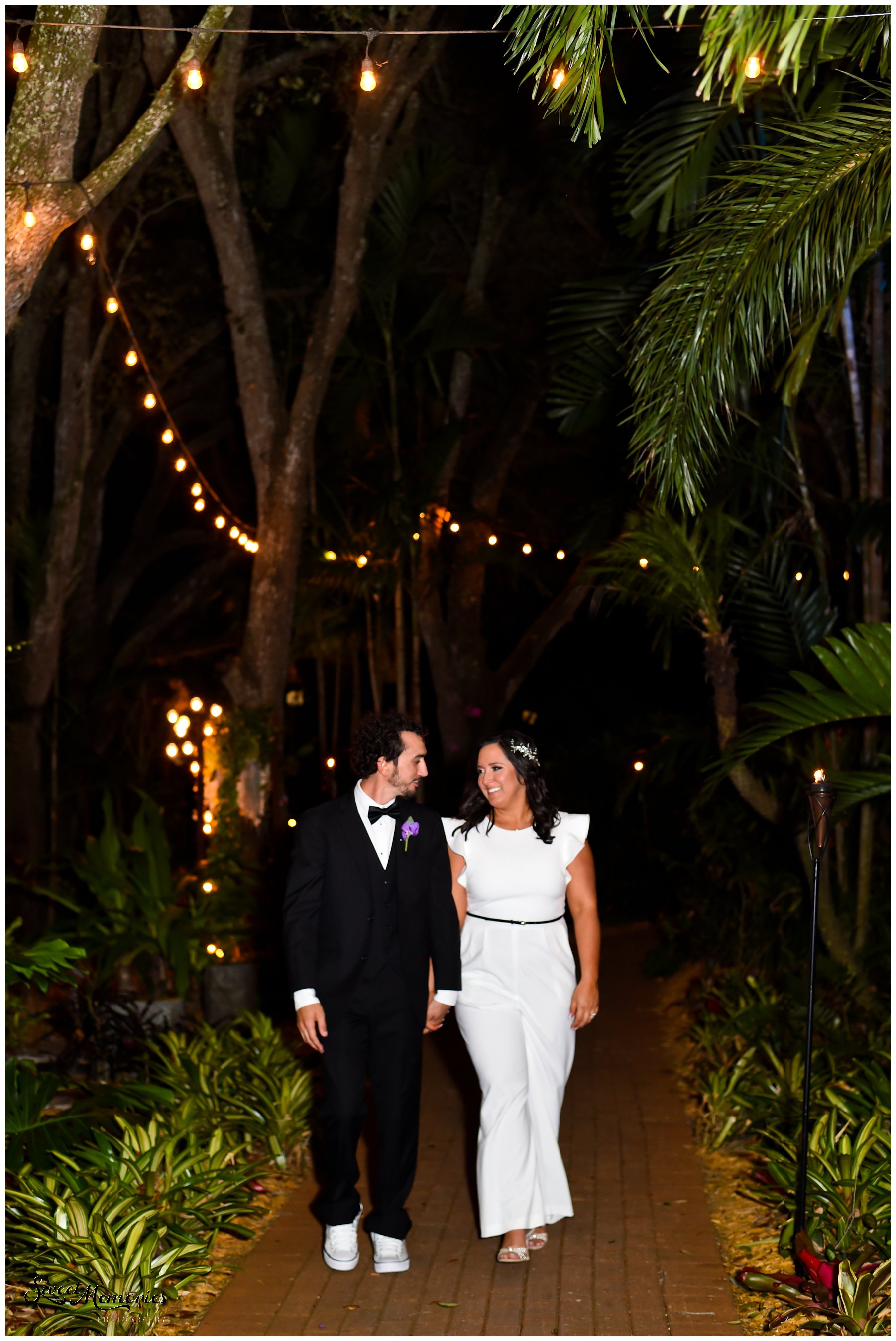 Tropical yet classic, Janice and Michael's Living Sculpture Sanctuary wedding in Davie was the perfect mix of romantic, hilarious, fun, sweet, and chic! After having met at a restaurant, his persistence, and a romantic proposal at the Flamingo gardens, they are now ready to tie the knot!