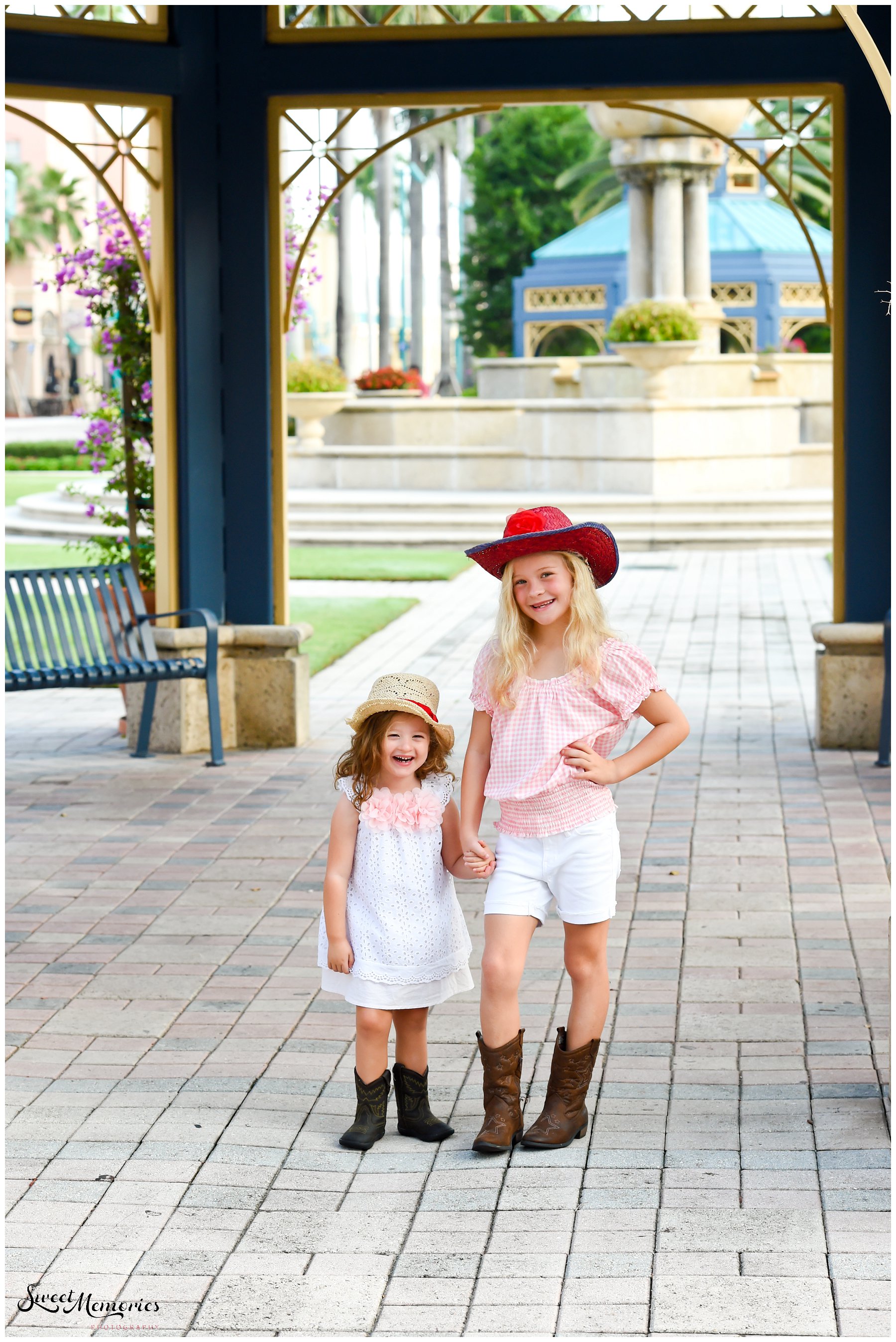 If you're familiar with Boca Raton, you're familiar with Mizner Park. A luxury landmark filled with unique boutique stores and restaurants, it's located in the heart of Boca. Its pink buildings and beautiful architecture are perfect backdrops for any session. Not to mention that it's lined with picturesque gazebos, fountains, and landscaping! So what better spot for these adorable Mizner Park portraits?!