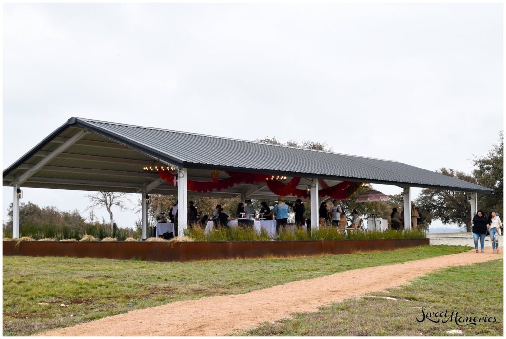  Guests can enjoy cocktails on the covered patio or at the indoor/outdoor farmhouse bar. And only a walk away from the two ceremony sites!