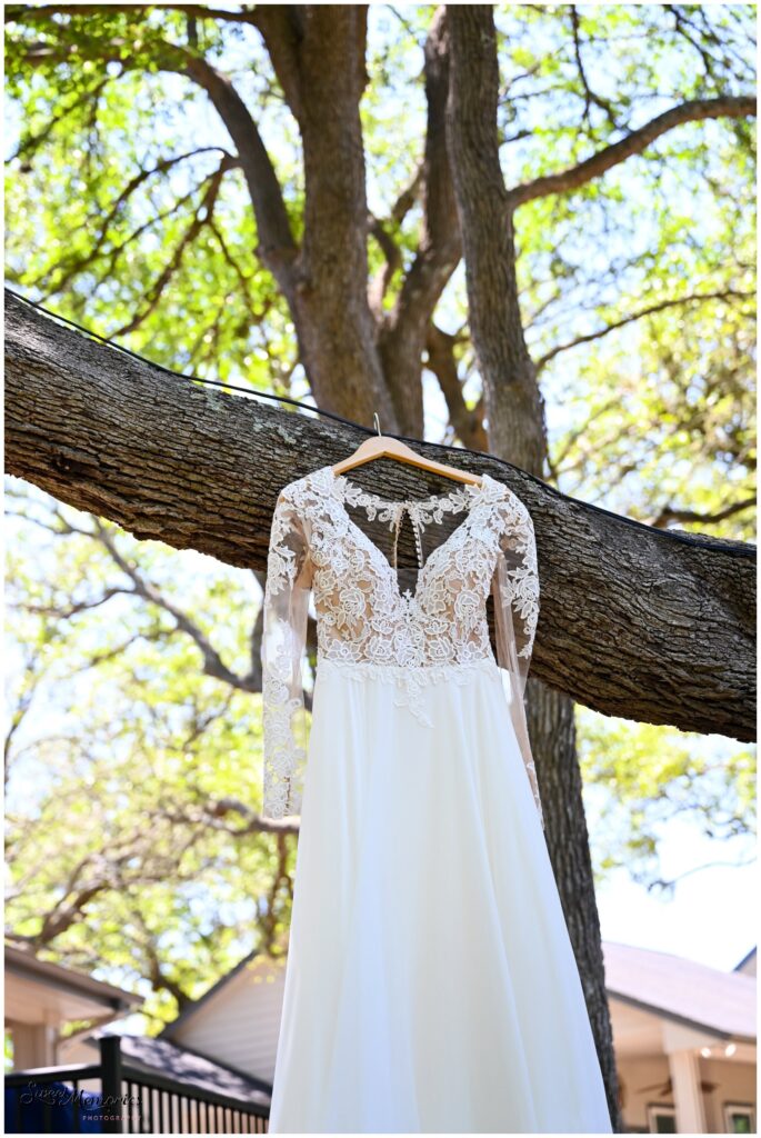 Kathleen's beautiful wedding dress hanging.