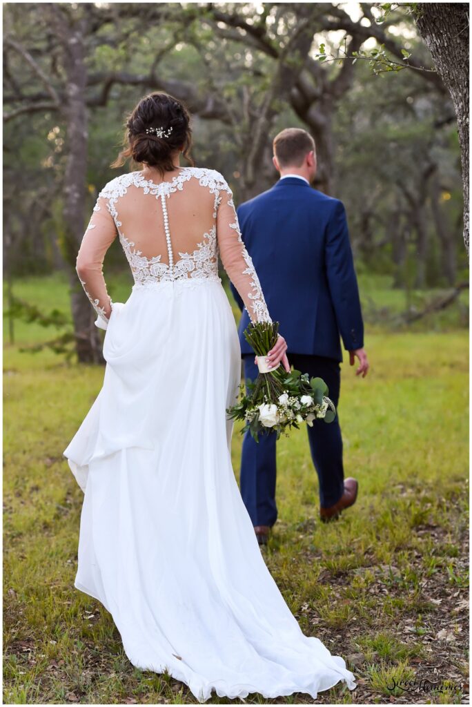 A candid shot of them walking through Whispering Oaks.