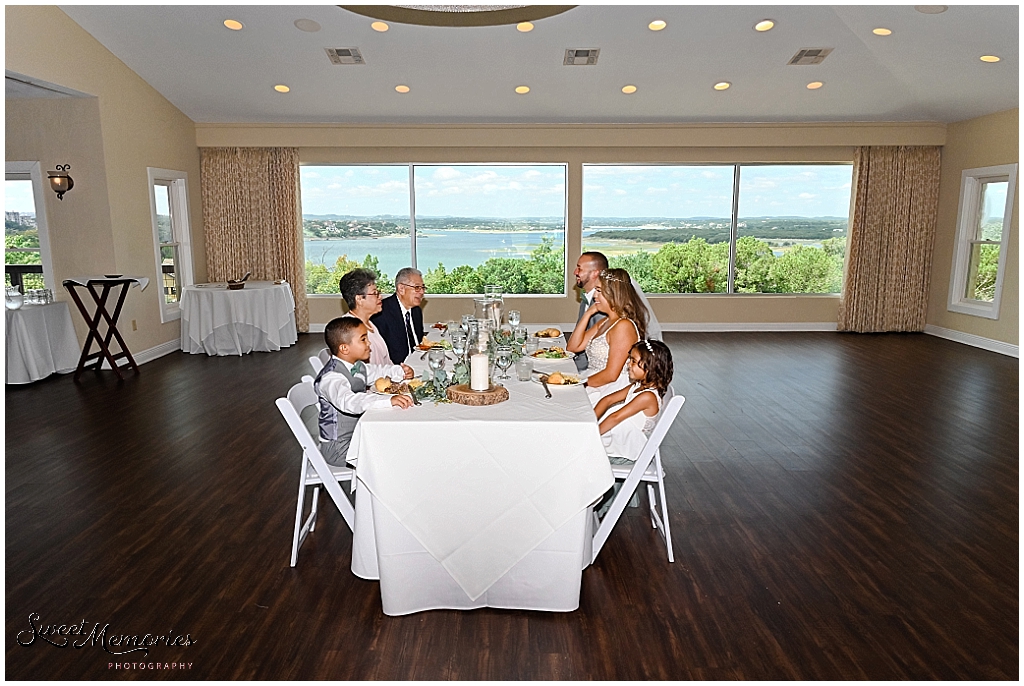 The wedding party enjoying their meal.