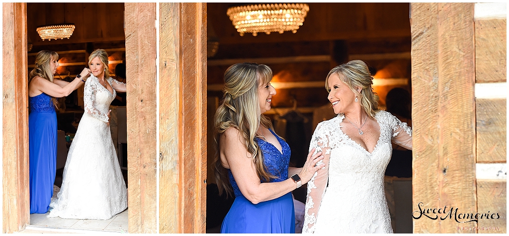 Getting into her gown at this Texas Old Town wedding.