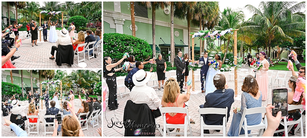 They chose to have bubbles to be incorporated as they walked down the aisle for the first time as husband and wife.