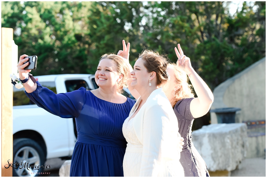 The sisters taking a selfie.

