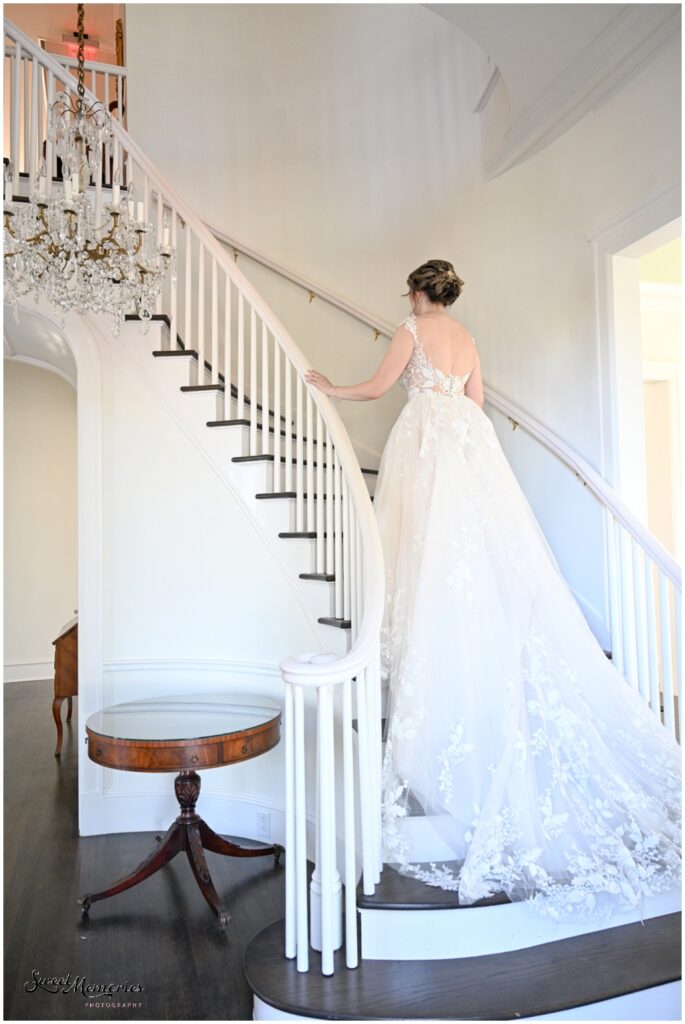 On the staircase at Woodbine Mansion