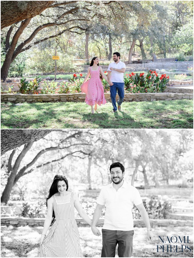 Newly engaged couple running through the grass at the park in austin, texas.