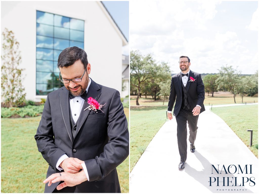 Groom adjusting his cuffs and walking towards the camera.