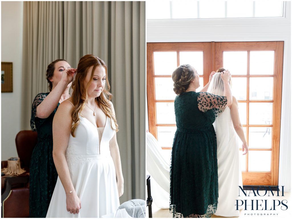 The maid of honor putting on the bride's veil at the Driskill in Downtown Austin.