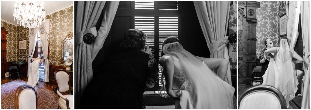 The bride looking out the window at the Downtown Austin wedding ceremony site.