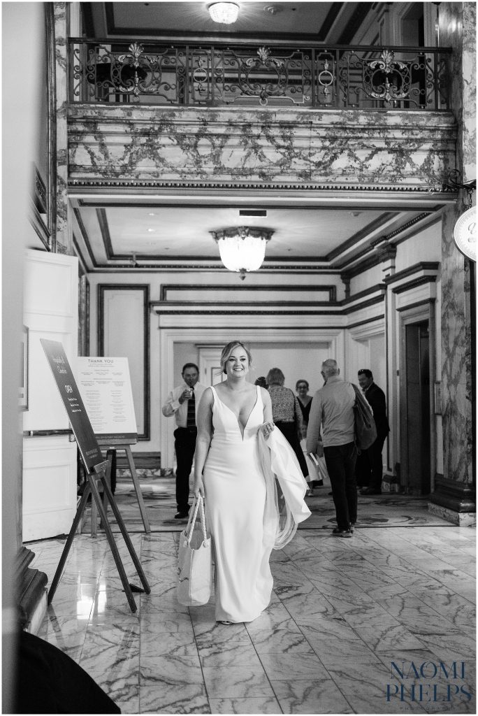 The bride walking down to the first look at the Fairmont in San Francisco.