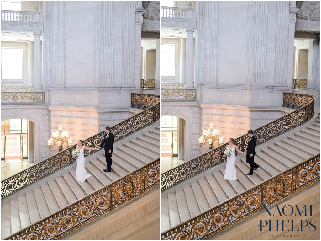 Bride and groom walking down the staircase at San Francisco city hall.