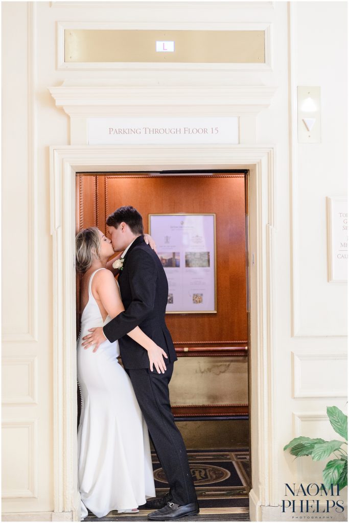 An elevator photo of the couple after their San Francisco city hall wedding.