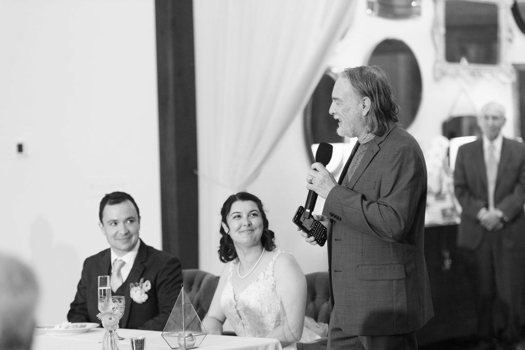 Father of the bride giving a toast at a Pecan Springs Ranch wedding.