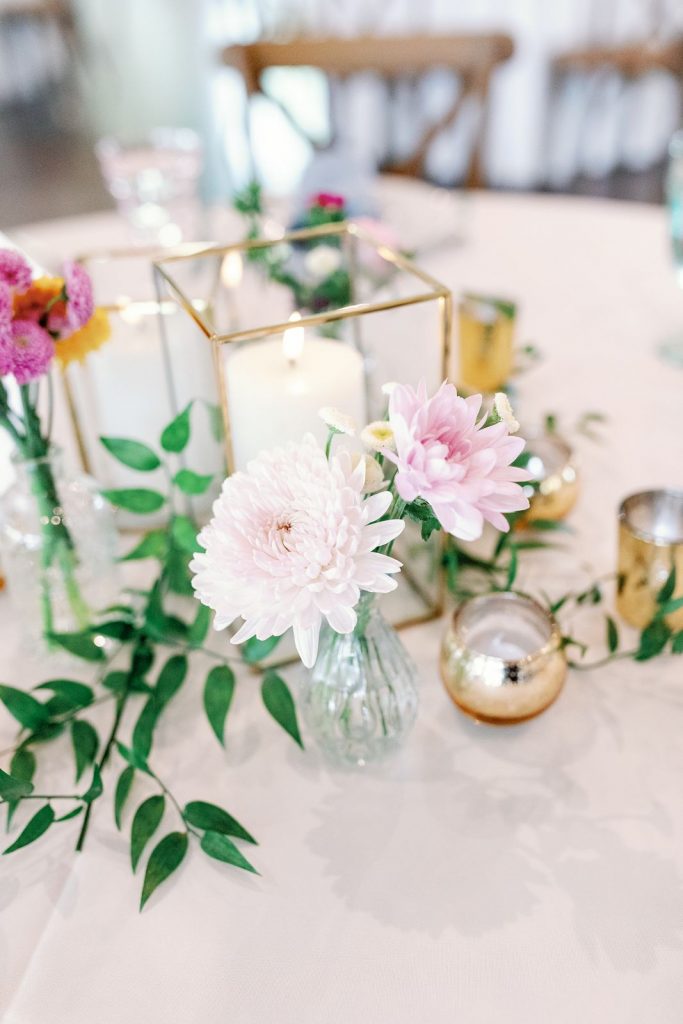 Floral centerpiece at Pecan Springs Ranch wedding.
