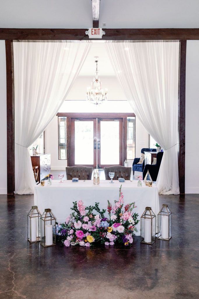 Sweetheart table design at Pecan Springs Ranch wedding reception.